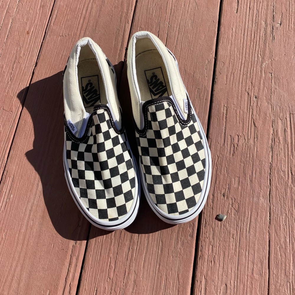 Checkerboard slip-on vans